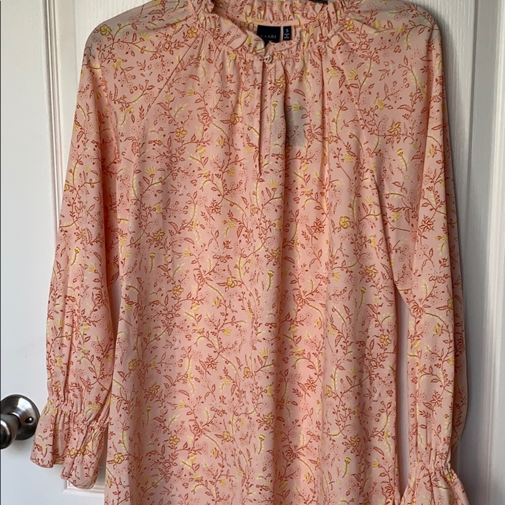 Tunic style shirt. New with tags. Keyhole detail
